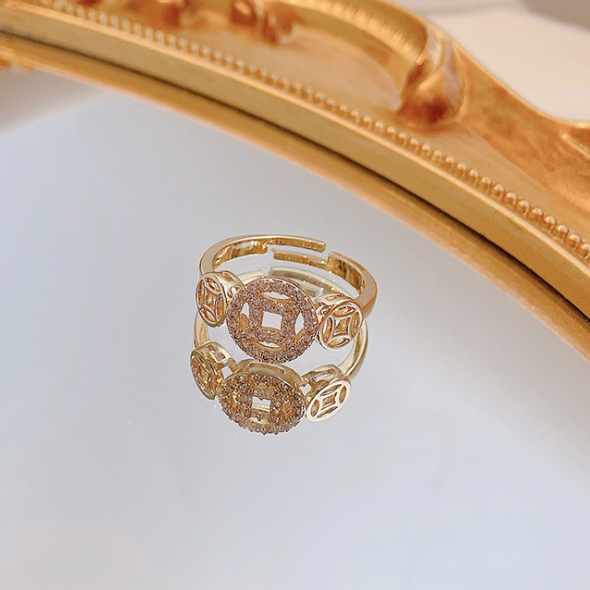 CHINESE WIND COPPER RING.