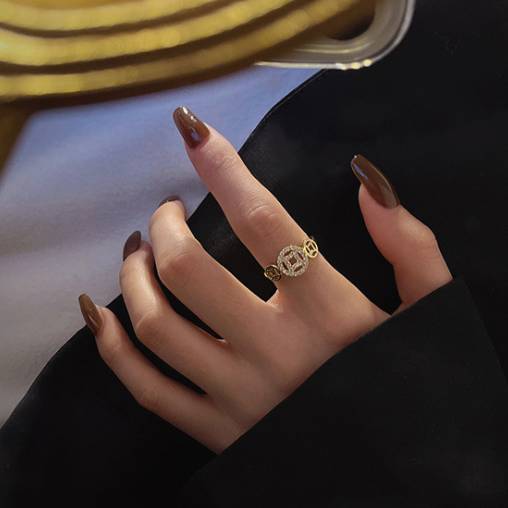 CHINESE WIND COPPER RING.