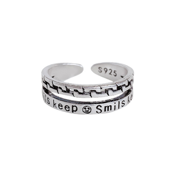 WORDS OPENING AND SMILING FACE RING.