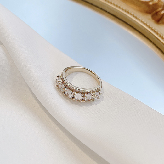 A RING WITH SOME PEARLS.